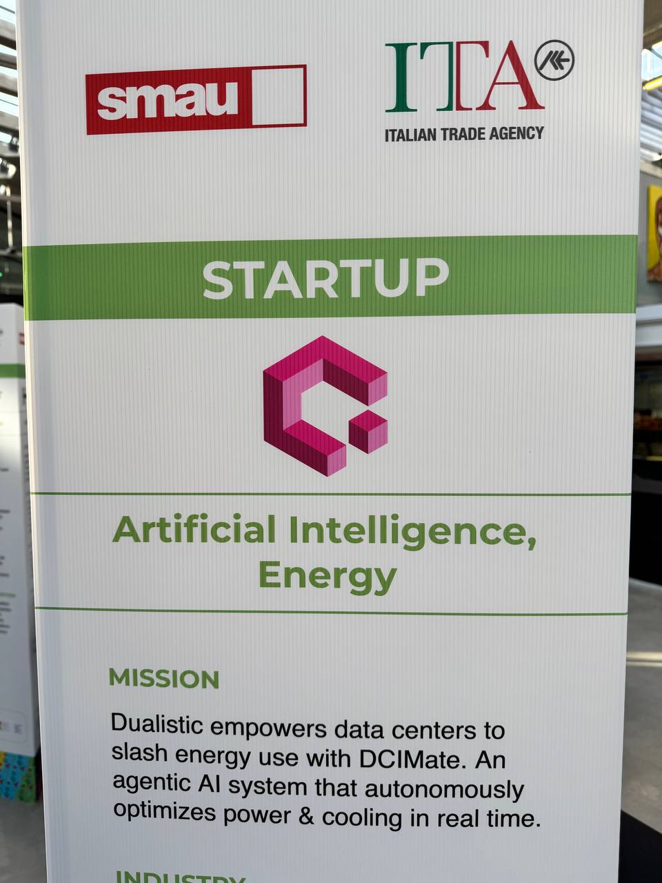 Dualistic booth at SMAU Paris with the startup banner